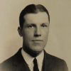 White man in suit and tie