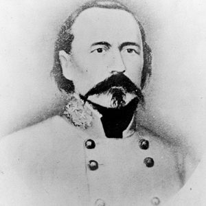 White man with mustache in gray military uniform