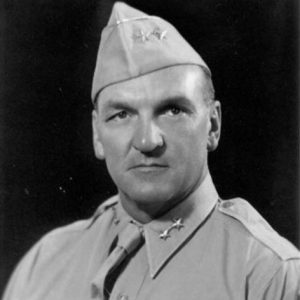 White man in military uniform with cap