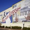 "Scott Joplin American Composer" painted mural on brick building showing black hands on piano keys