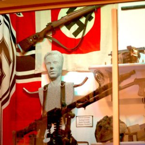 Nazi flags and guns on display