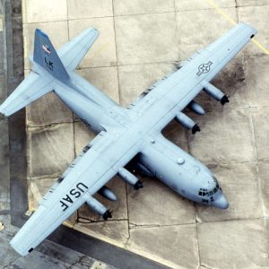 Four engine "USAF" airplane parked on a runway