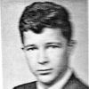 Young white man in suit and tie