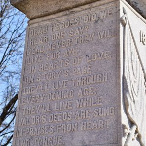 "Dead heroes! Did we hear one say?" inscription on monument