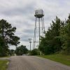 Rural road and buildings with water tower