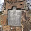 "These stones memorialize Old Lewisburg first trading post of Conway county" plaque on brick monument