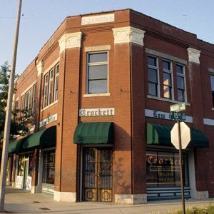 Two-story brick "Crockett Law Office" building on street corner