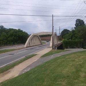 Concrete arch bridge on road