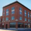 Multistory brick building on street corner