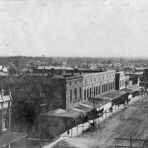 Looking out over multistory brick buildings on street