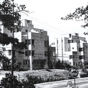 Multistory multilevel buildings on street with power lines