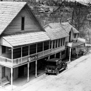 Multi-story building with balcony and covered porch