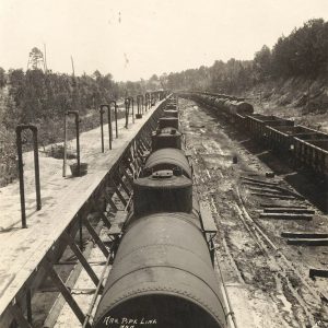 Two rows of train cars on railings