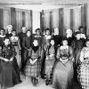 Group of young African-American women posing in dresses