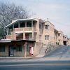 Row of multistory brick buildings and street