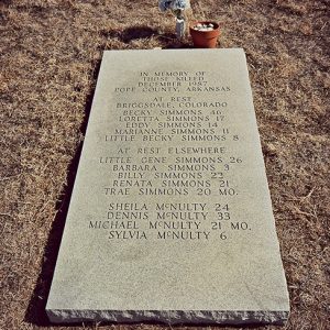 "In memory of those killed December 1987 Pope County Arkansas" flat engraved marker on grass