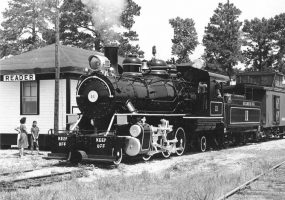 Steam locomotive parked at "Reader" train station