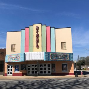 "Rialto" with multicolored marquee on street