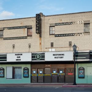 "Ritz Theater" building with marquee over sidewalk