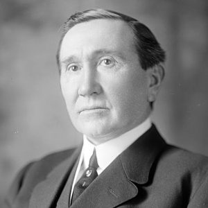 White man in suit and tie