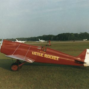 Red propeller-driven airplane "Little Rocket"