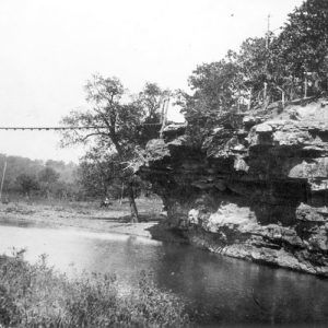 Suspension bridge over a river between two cliffs