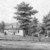 Women in dresses talking by a fence with schoolhouse and trees