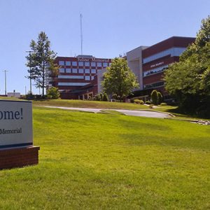 Multistory buildings with sign on hill side