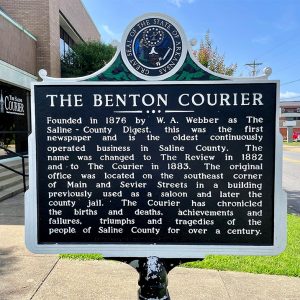 Sign with information regarding the Benton Courier