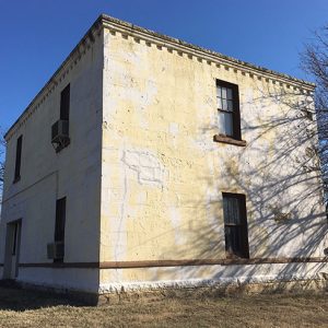 Close-up of rectangular two-story building