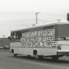 Bus on road with "Good Sam club supports law enforcement officers torch run special Olympics" written on it