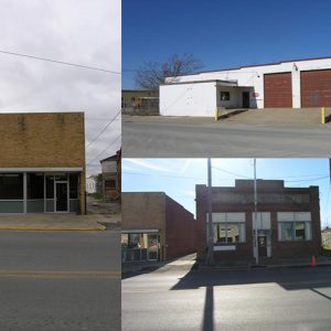 Two single-story brick storefront buildings and two-car garage building on street