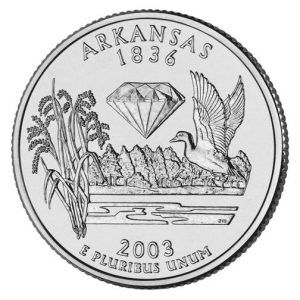 Back side of coin engraved with the words "Arkansas 1836," a diamond, river scene with duck and flowers, and "2003 E Pluribus Unum" below that