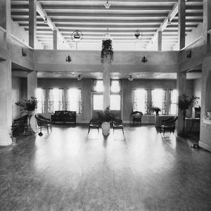 Multistory lobby room with furniture and balcony