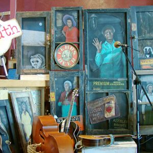 Instruments and painted set with microphone and sign