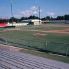 Baseball diamond and outbuildings as seen from bleachers