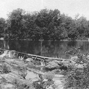 Multistory building next to impounded river