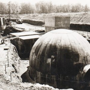 Concrete structures and round concrete dome in open pit