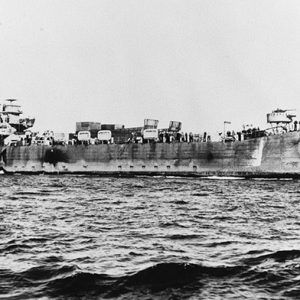 Vehicles on deck of Naval vessel 887 at sea