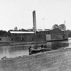 Naval side wheel steamboat on river with sailors in lifeboat landing on shore