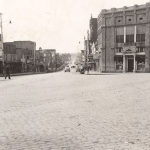 View looking street with multistory buildings on both sides