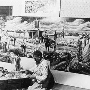 White man with painting of farmers and animals at work