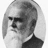 White man with long beard in suit in oval frame