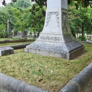 "W. B. Worthen" monument and gravestone in cemetery