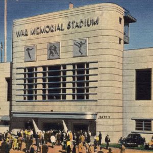 Crowd gathered outside art deco football stadium