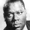 African-American man in suit and striped tie