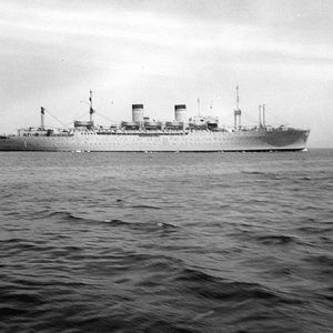 Large ship with two smoke stacks at sea