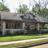 Two-story house with covered porch and drive way