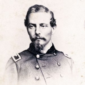 White man with beard and mustache in military uniform