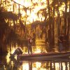 two white man in power boat fishing in bayou